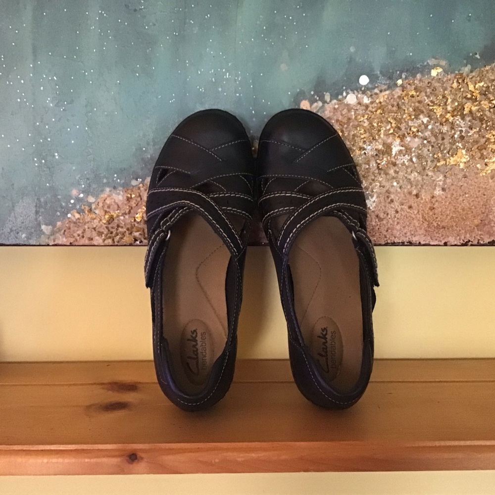 Clark bendable black flats